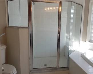 Glass shower surround