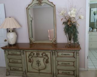 Romweber bedroom dresser      21'  x  80"  Color  is  gray  with  gold  accents.