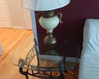 one  of  two  matching  glass  top  lamp  tables-  there  is  a  coffee  table  that  matches  them