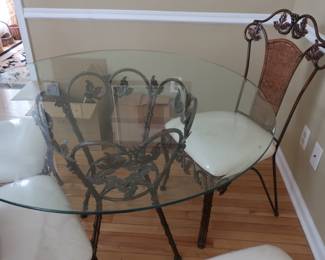 kitchen  glass  top  table  and  four  chairs    44"  x  44"
