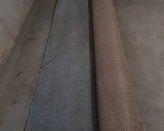 large  piece  of  carpeting-   gray