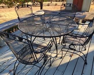 Wrought Iron Garden Table and Four Chairs. 
