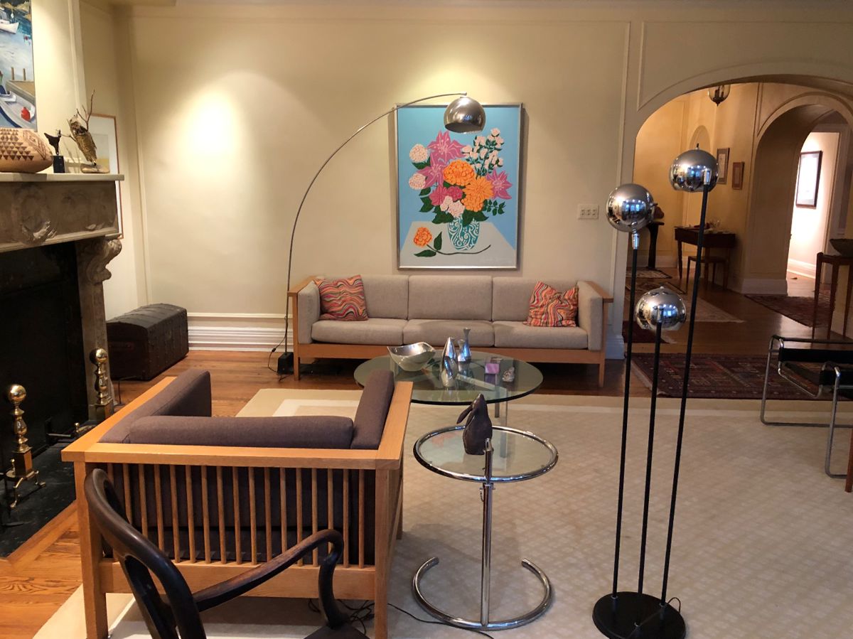 Renee Demsey oil painting (Cleveland), Eileen Gray style side table, vintage triple chrome head floor lamp, vintage oak frame sofa & arm chair, vintage chrome & metal base arc floor lamp. Mid Century Modern furnishings!