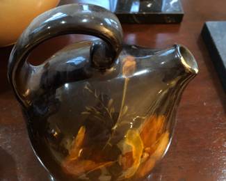 Another jug with chips on rim & base, with an unusual mark