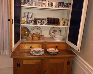 Country cupboard with cobalt door panes