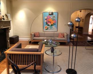 Renee Demsey oil painting (Cleveland), Eileen Gray style side table, vintage triple chrome head floor lamp, vintage oak frame sofa & arm chair, vintage chrome & metal base arc floor lamp. Mid Century Modern furnishings! 