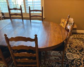 Round dining room table with leaves