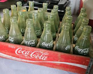 COCA COLA BOTTLES AND WOODEN CRATE