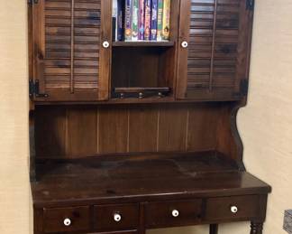 Beautiful Desk with Hutch, Lots of VCR Tapes Disney & More. VCR Player, DVD Player. The Desk w/ Hutch is 2 pieces is 40 inches wide by 19 inches deep. The desk is 30 inches tall and the Hutch part.is 48 inches tall.