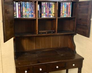 Beautiful Desk with Hutch, Lots of VCR Tapes Disney & More. VCR Player, DVD Player. The Desk w/ Hutch is 2 pieces is 40 inches wide by 19 inches deep. The desk is 30 inches tall and the Hutch part.is 48 inches tall.