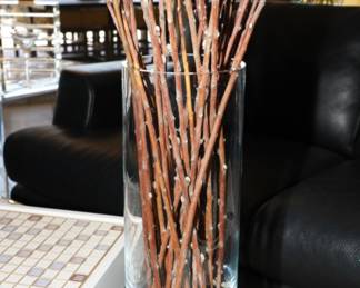 Tall cylindrical glass vase with decor