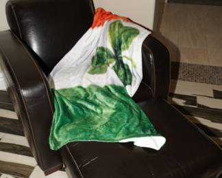 Faux leather armchair with ottoman-needs a bit of TLC