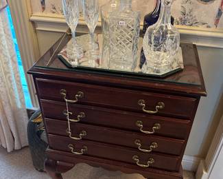 Mahogany silverware chest, crystal decanters and stemware