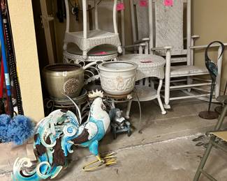 Wicker patio furniture, metal yard art