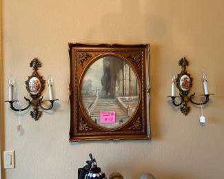 Pair of lighted sconces and mirror