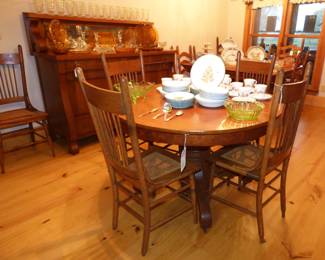 Antique Oak Pedestal Table (has 1 leaf), 6 antique oak chairs with cane seats.  See Next 2 Pics