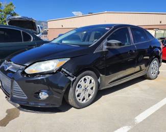 2012 Ford Focus FWD, Black, VIN -1FAHP3F29CL372700