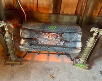 Fake fireplace with lights and sound $75, Eagle brass andirons $150