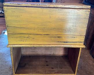 Mustard painted cupboard with lift top for storage $250