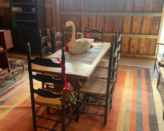 Trestle table $600, Ladderback black chairs $400