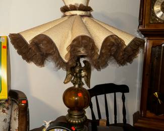 Pair of vintage Eagle lamps with amber glass globe