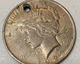 Holed 1923 Silver Dollar