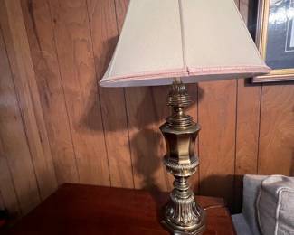 One of a pair of Heavy Tall Brass Lamps