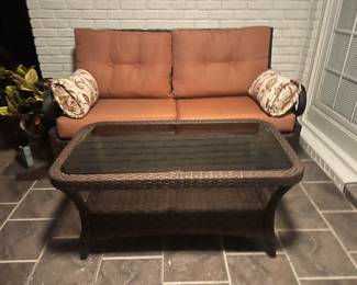 4 piece patio set with Sunbrella Fabric includes loveseat, coffee table and 2 chairs with rocker backs.  