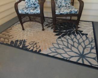 Rug is indoor/outdoor  5.3x7.5 (chairs sold)