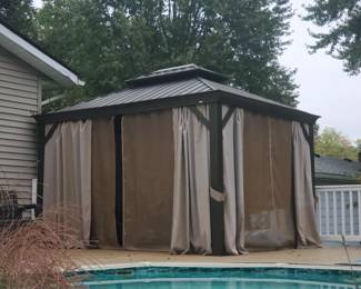 Outdoor Pergola showing Canvas Sides and Bug Screen