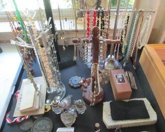 Great collection of costume jewelry, knives, collectibles coins, paper money, handmade smoking pipes, antique watches, Apple products, Obsidian stones, 1886 coin bag, 1920s RARE condiment set and more.