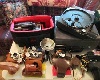 Vintage cameras! Argus, Polaroid, Nikon, Kodak, Handycam, Vivitar, Lenses, bags, tripods, and so much more!