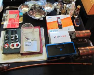Great collection of costume jewelry, knives, collectibles coins, paper money, handmade smoking pipes, antique watches, Apple products, Obsidian stones, 1886 coin bag, 1920s RARE condiment set and more.