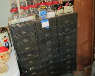 An amazing metal cabinet for a garage or a unique decor piece for inside a home.