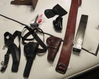 Gun holsters, belts, and more