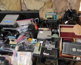 Vintage cameras! Argus, Polaroid, Nikon, Kodak, Handycam, Vivitar, Lenses, bags, tripods, and so much more!