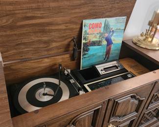 Hideaway vintage entertainment center with built in speakers