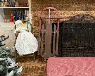 Looking at the fireplace, sled, handmade pillowcase doll, lots of John Grisham hard back books