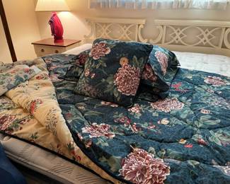 A close look at the King quilt, shams with pillows and cushions