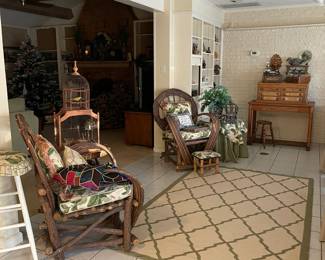 The sun room contains 2 wonderful hand made twig chairs
