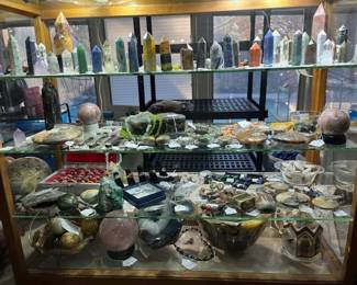 Large display case full of necklace and earrings with handmade beads, crystals, minerals, fossils, sterling rings, Sadler tea pots from England