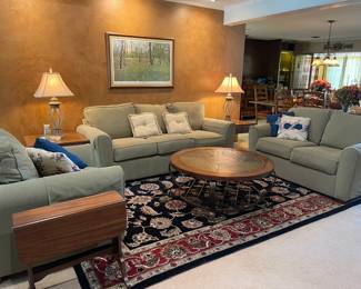 Cozy living room, sofa, love seat, chair, side tables, round coffee table, beautiful rug