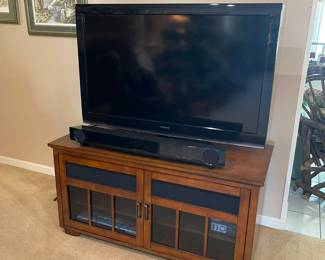 Entertainment stand with storage, Toshiba TV, sound bar