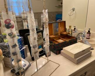 In the bathroom you will find vintage and costume earrings, vintage jewelry boxes, bathroom items