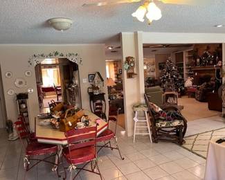 Breakfast area with kitchen in the foreground