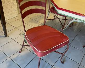 One of the 6 metal painted chairs with upholstered seats