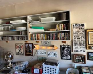 CD's, DVD's, and vintage books in the shelves
