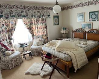 The guest room, great window treatments, accent chairs with or without covers, your choice. accent tables, framed doilies