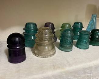Vintage Glass Insulators, including rare purple