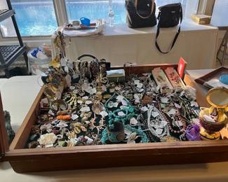 This showcase contains, lots of great vintage costume jewelry, turquoise, Austrian crystals, Chinese beads, vintage Boy Scout pins, Seasonal jewelry